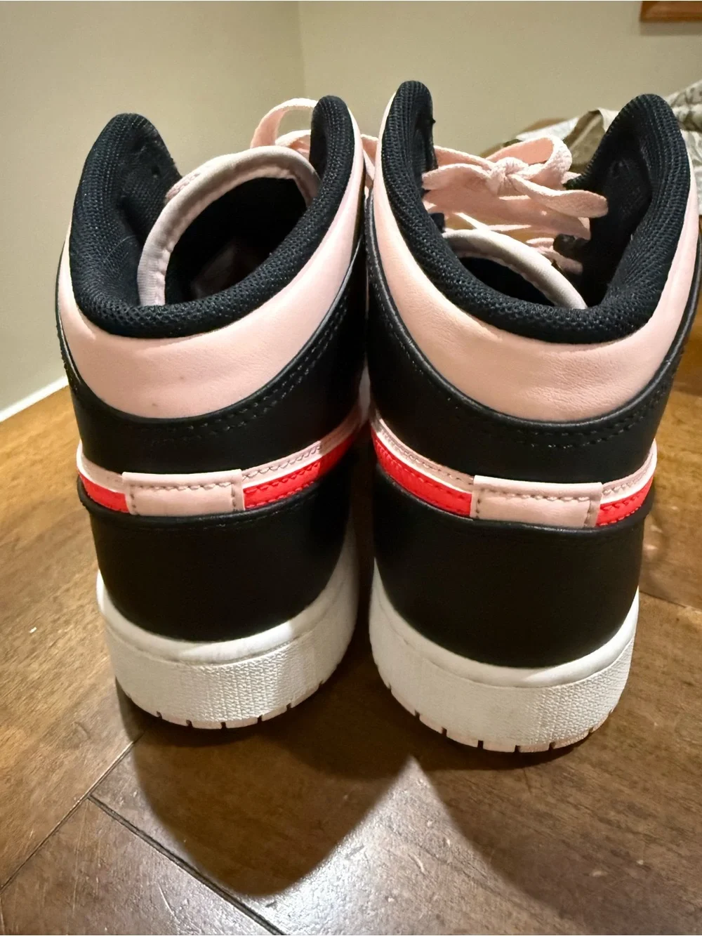 Nike Air Jordan Pink and Black High-Top Sneakers with Red Swoosh